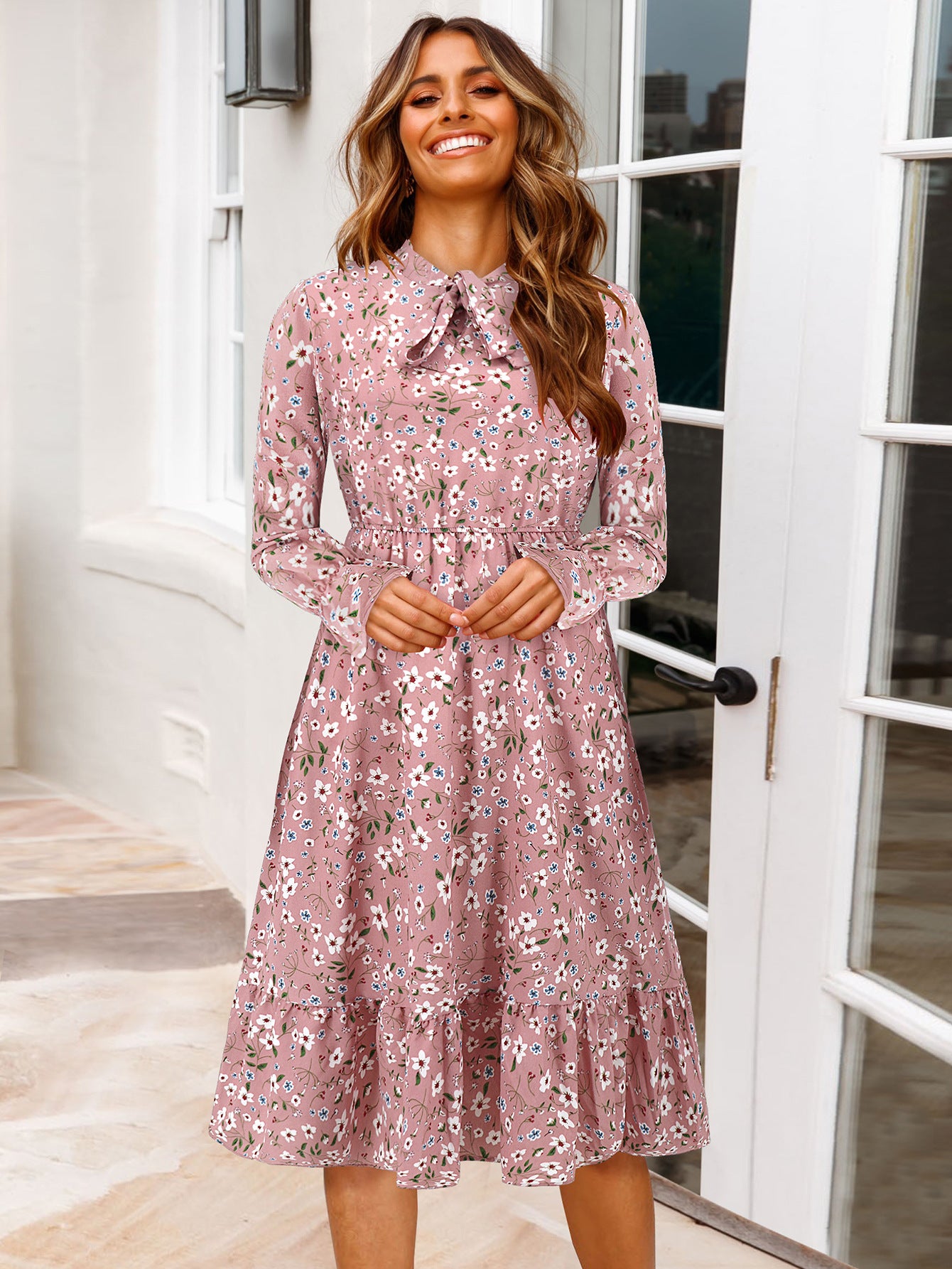 Women's midi dress with playful floral pattern and tie collar Caliora