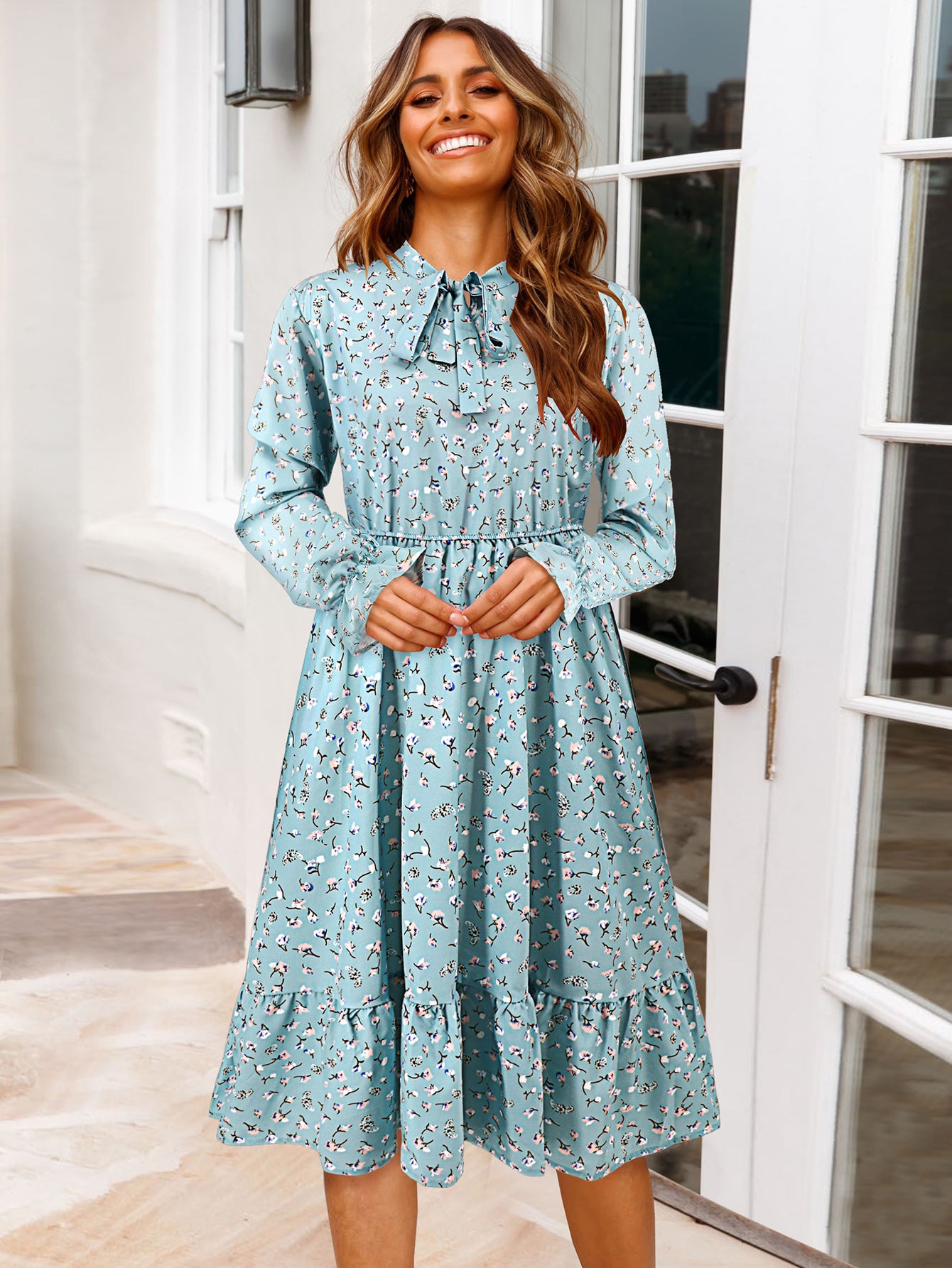 Women's midi dress with playful floral pattern and tie collar Caliora